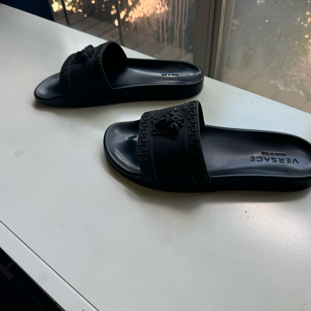 Versace slides authentic in a size 10 mint condition